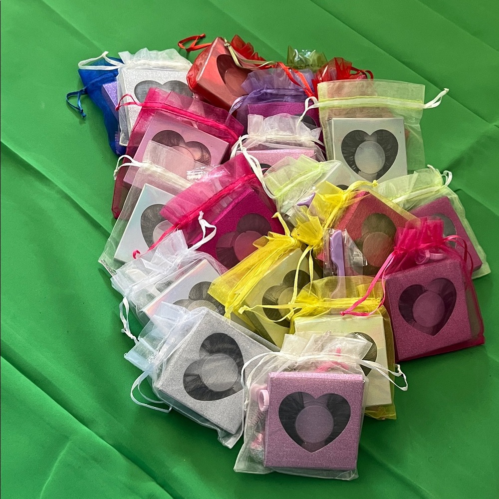 All Different Kind of Mink Lashes Inside Of A Colorful Heart Gift Bags